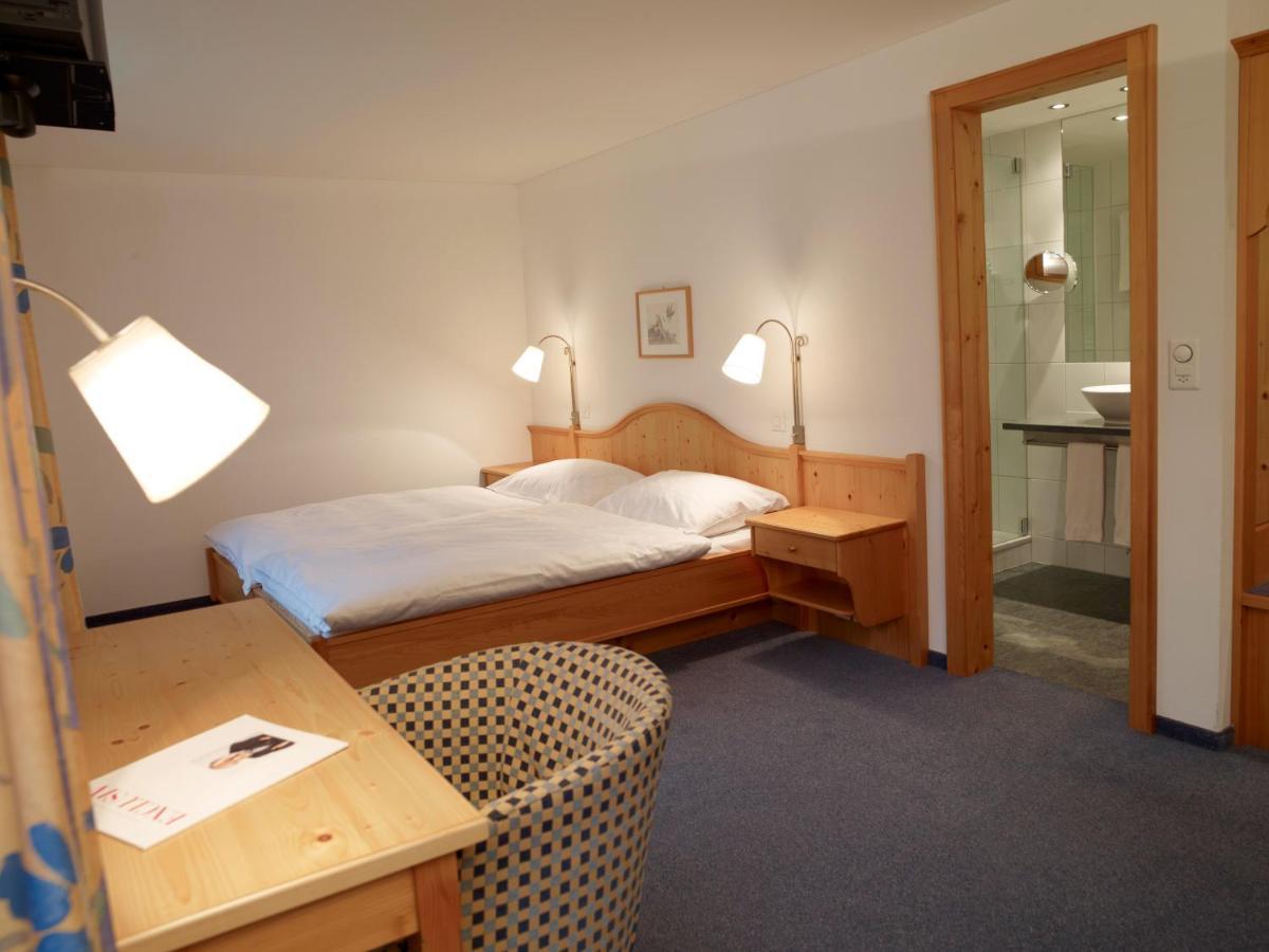 Hotel Alpina Парпан Экстерьер фото